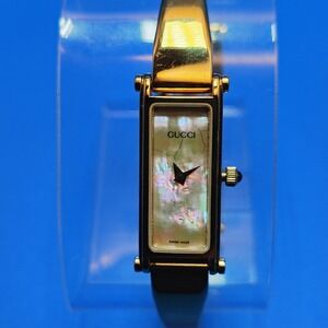 Gucci Gold-Tone Bangle Watch with Mother-of-Pearl Dial